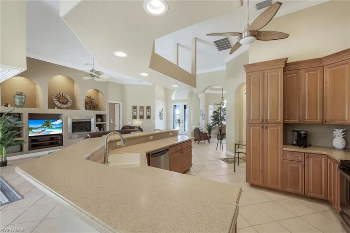 Spacious, open floor plan with bright lighting and lovely built-ins