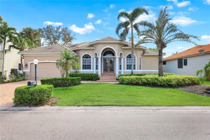 Beautiful front elevation with mature landscaping