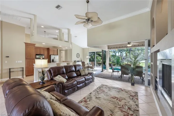 Great room view toward Kitchen, dining, lanai & pool