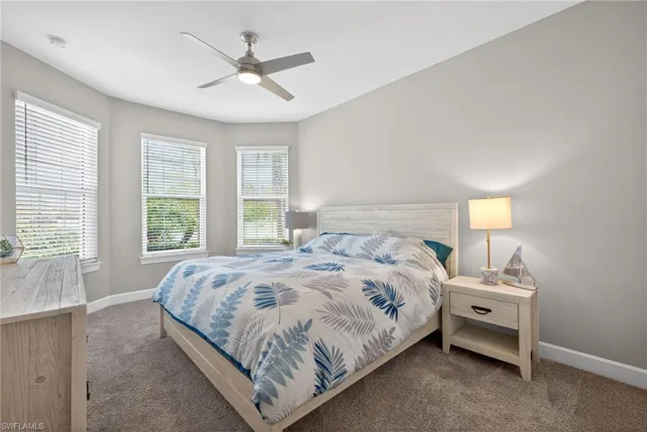 Bedroom 2 Carpeted bedroom featuring  and a ceiling fan