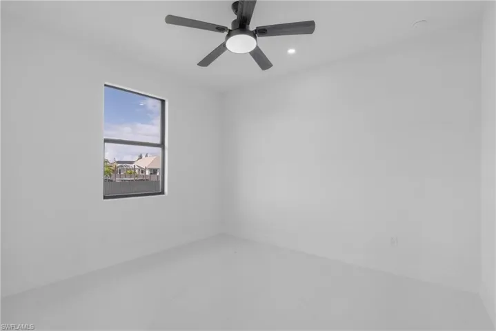Spare room featuring ceiling fan