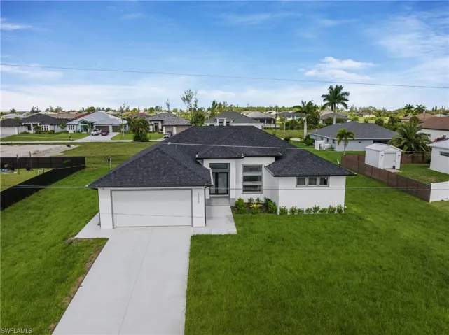 View of front of house with a front lawn