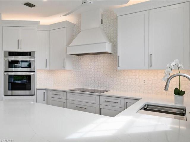 Stunning Mother of Pearl backsplash.