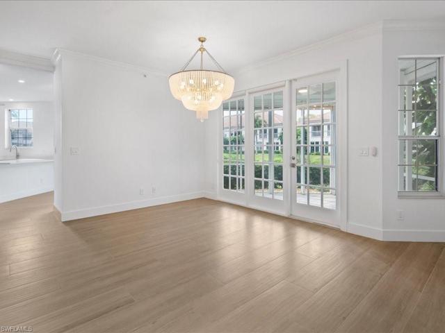 Light and bright open floor plan with walk out french doors to screened lanai