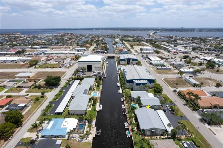 Discover this BEAUTIFULLY UPDATED FIRSTFLOOR GULF-ACCESS condo in the highlydesirable MARINA 46 CONDOMINIUM, nestledin the CAPE CORAL'S WATERFRONT PARADISE!