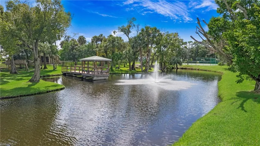 Water view featuring a tree filled landscape
