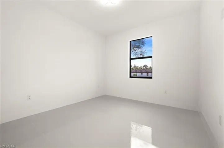 Empty room with baseboards