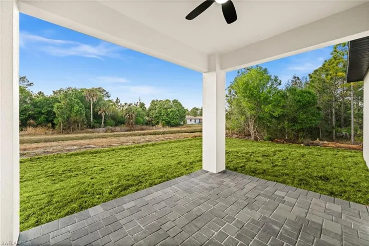 View of patio featuring a ceiling fan
