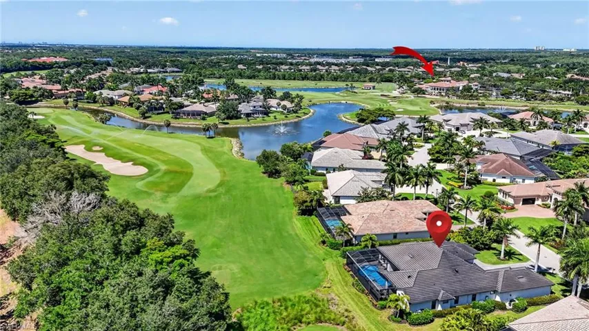 Expansive golf course and water features bordering residential properties