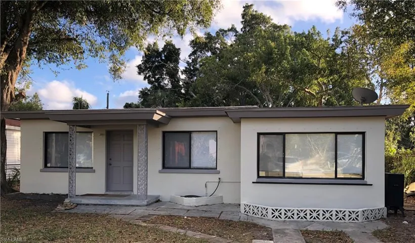 View of front facade with stucco siding