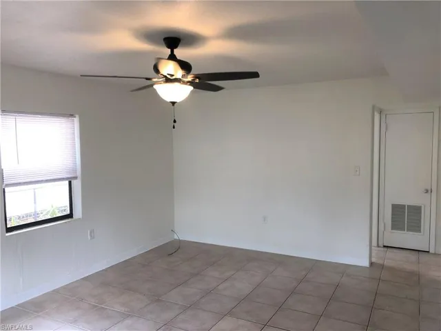 Unfurnished room with ceiling fan