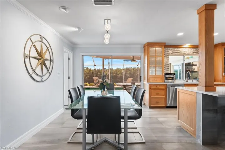 Great views of the pool and canal from your dining area.