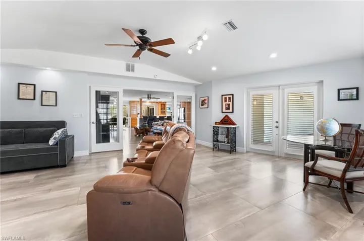 This is your 2nd living area.  You can close the french doors for full privacy if needed.