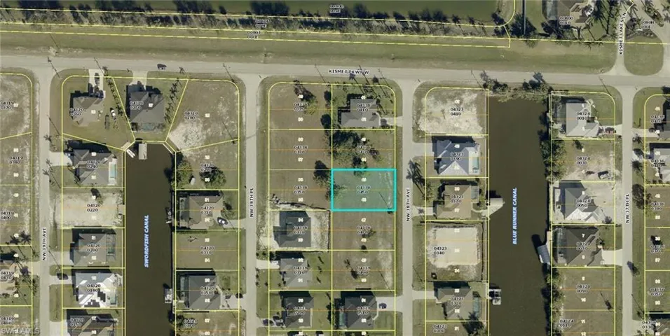 Aerial map of property and surrounding area with property parcel outlined