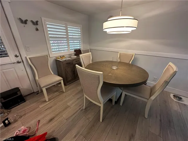 Dining space with light wood-type flooring