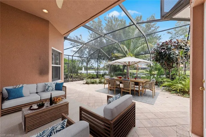 oversized lanai with covered seating**virtually staged**
