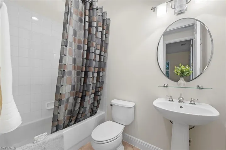 Full bath across hall from bedroom 4