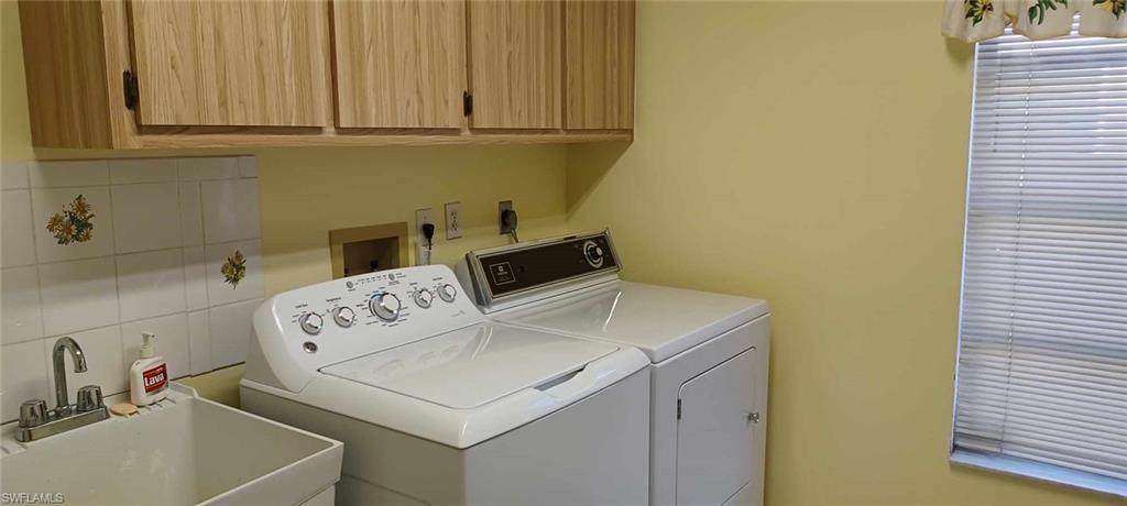 Laundry Tub, cabinets and Washer/Dryer