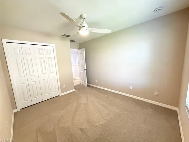 Guest bedroom #2 with plush rug