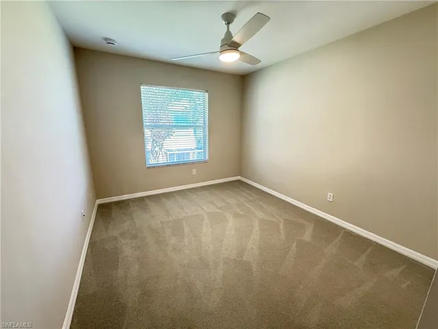 Guest bedroom #2 with plush rug