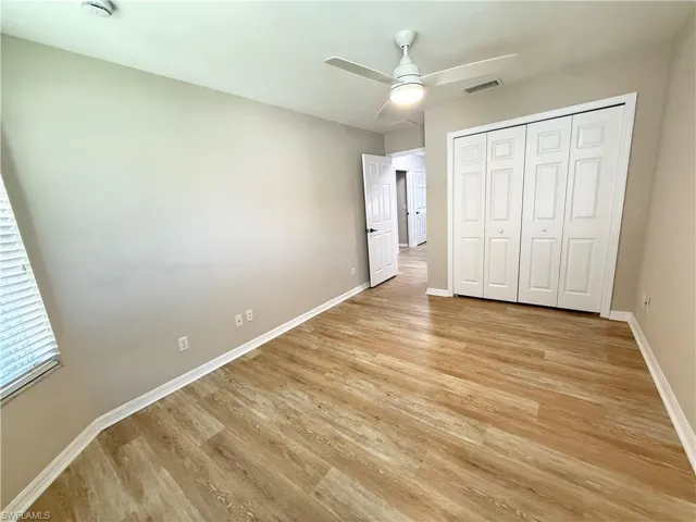 Guest bedroom #1 with laminate