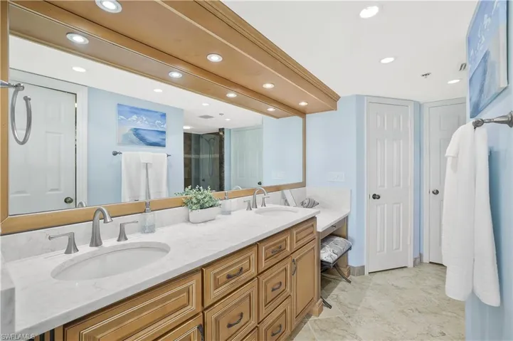 Double vanity, quartz counters, custom built-ins