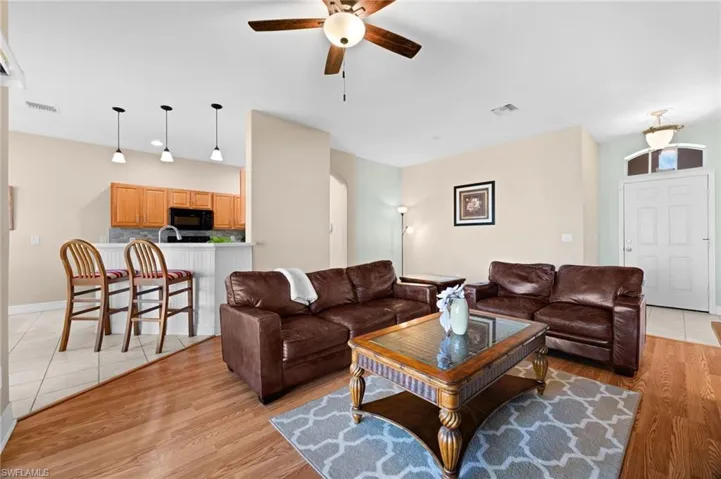 Living Room is next to the Breakfast bar