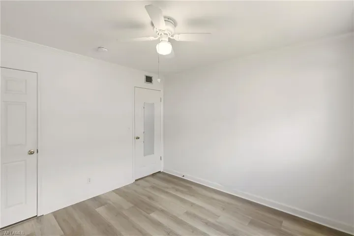 Guest bedroom with new flooring entry view #3