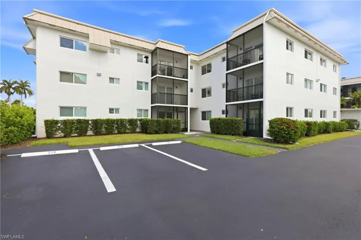 First floor #113 condominium is located on the sunny, southwest left side of this building #2