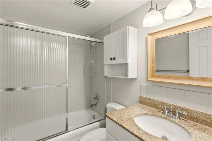 Guest updated bathroom with bathtub and shower