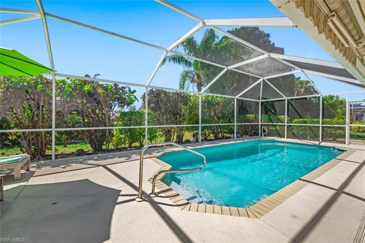 Pool with a patio and a lanai