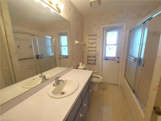 Guest bath door to lanai.