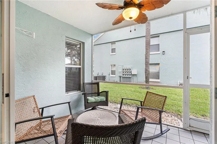 Screened patio with ceiling fan and a patio