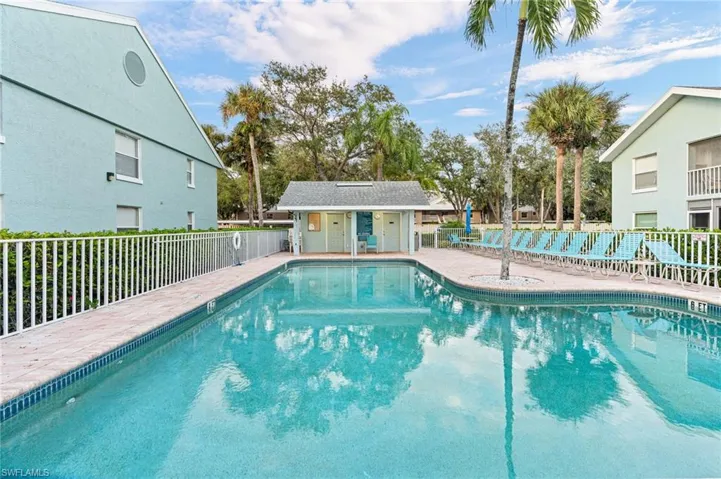 Community pool featuring a patio