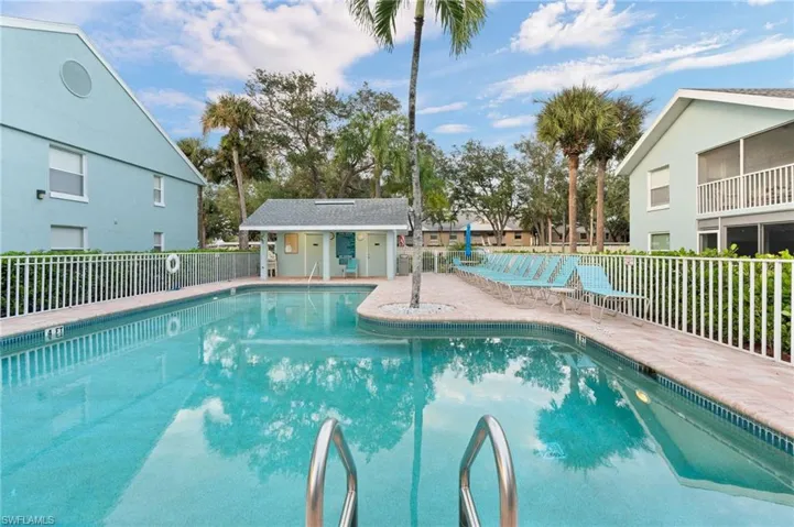 Community pool featuring a patio area