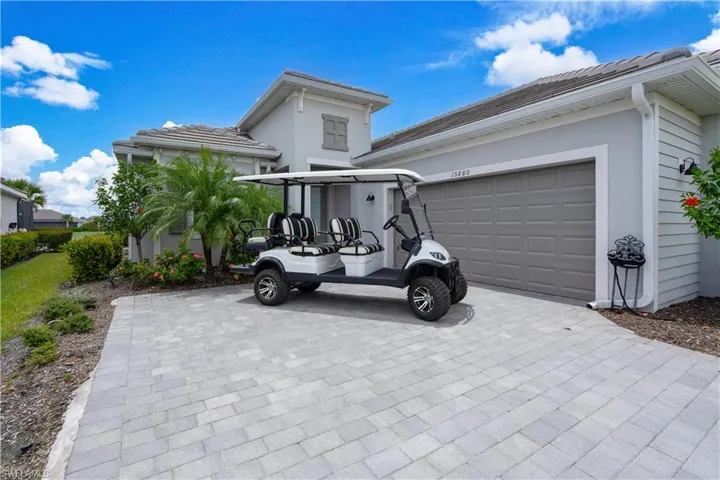 View of front of property with a garage