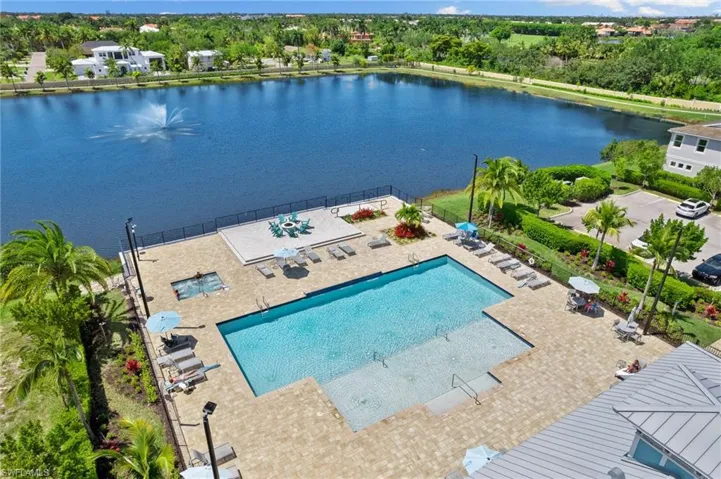Bird's eye view of a large body of water and a pool area