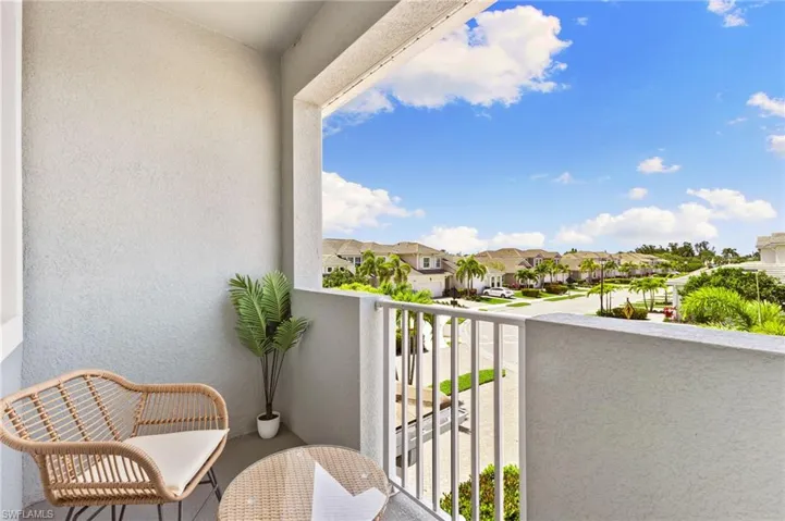 Balcony featuring a residential view