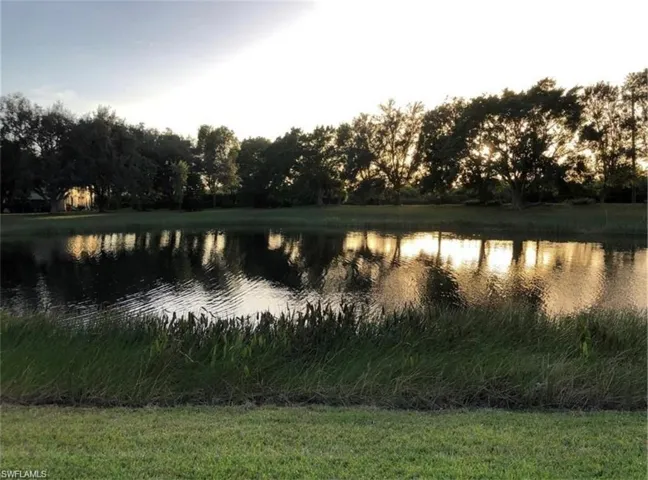 Water view from living area, porch and primary bedroom