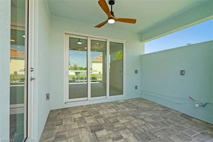 View of patio / terrace featuring a ceiling fan