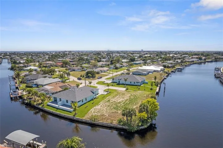 Drone / aerial view featuring a residential view and a water view