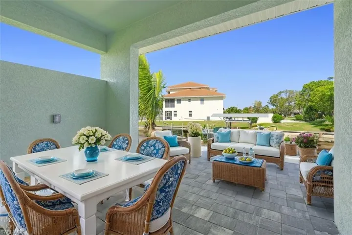 View of patio / terrace with an outdoor hangout area and outdoor dining area(Staged Photo)