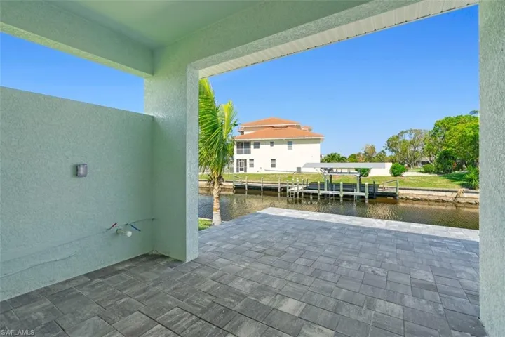 View of patio / terrace with a water view