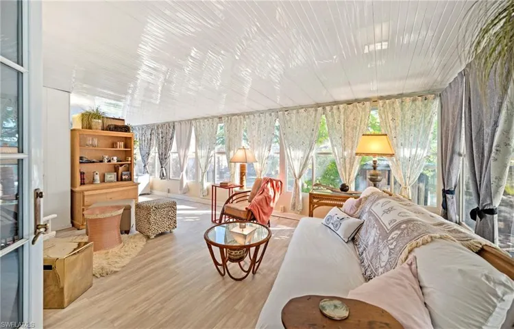 Sunroom / solarium featuring wood finished floors