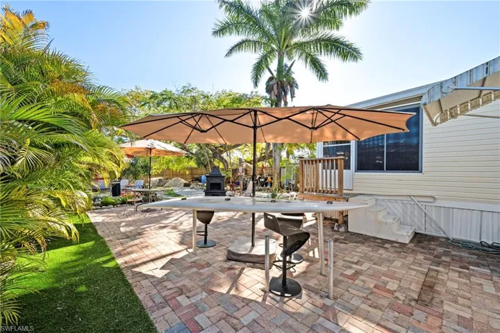 View of patio featuring outdoor dining area