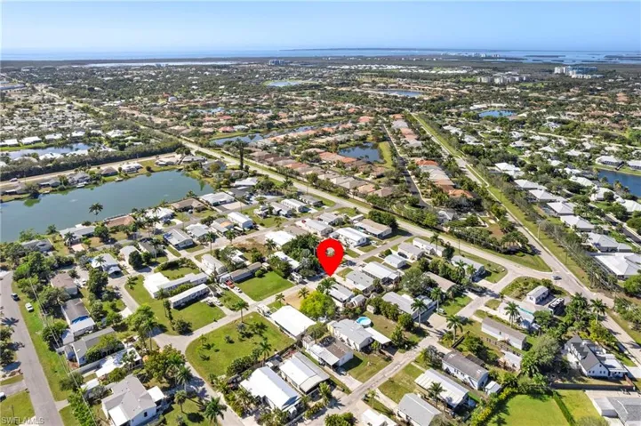 View of property location with nearby suburban area