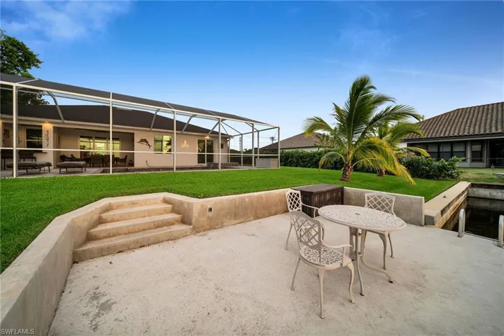 View of patio with glass enclosure
