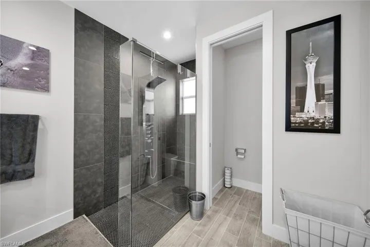 Bathroom featuring a tile shower