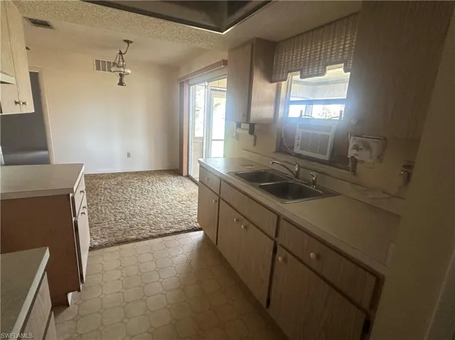 Kitchen with a view of the dining room