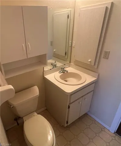Bathroom two leads out to the sun room